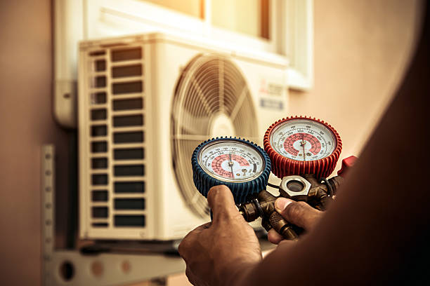 Professional Heat Pump Repair technician working in Erie, PA
